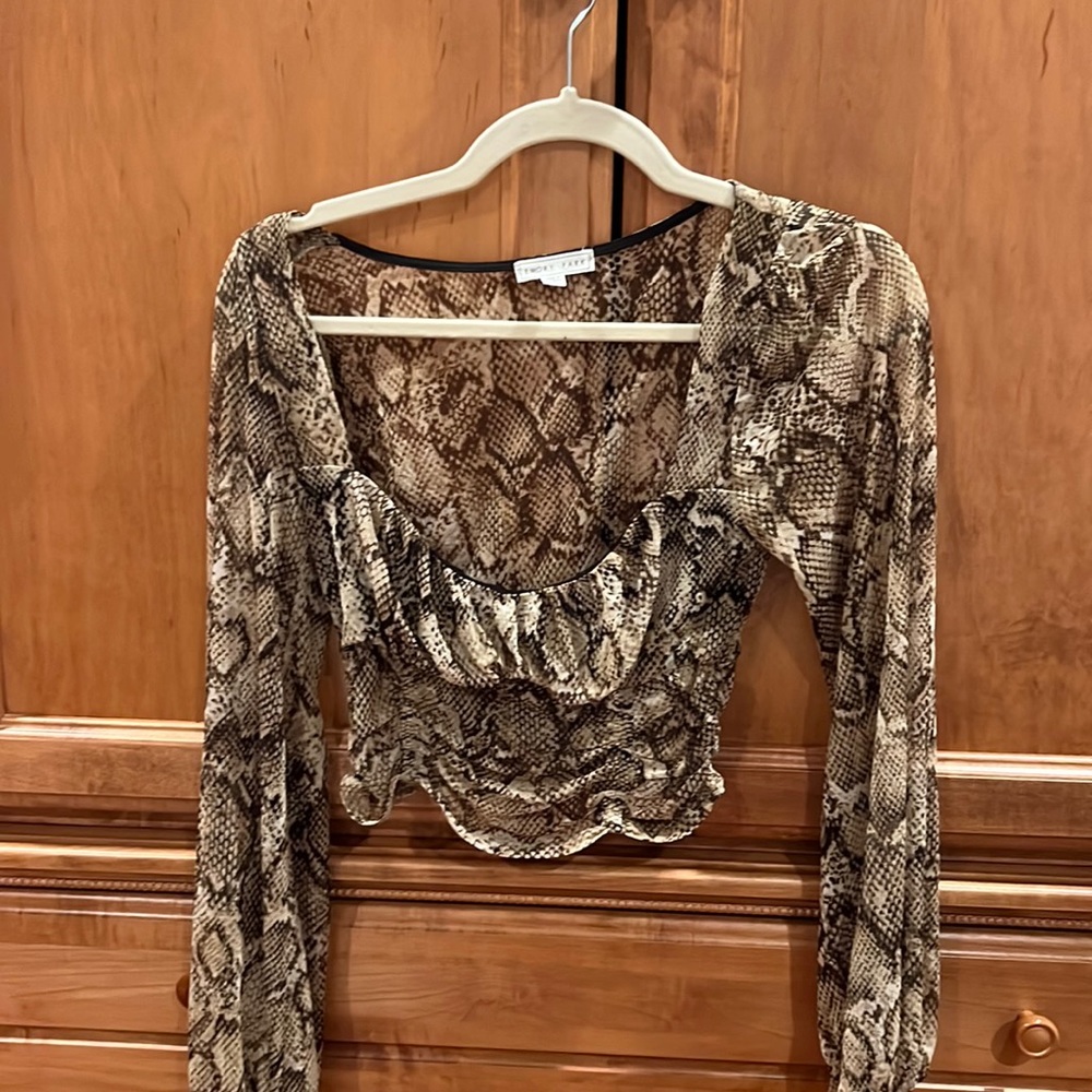 Long Sleeve snake skin printed long sleeve shirt from Hazel Boutique.